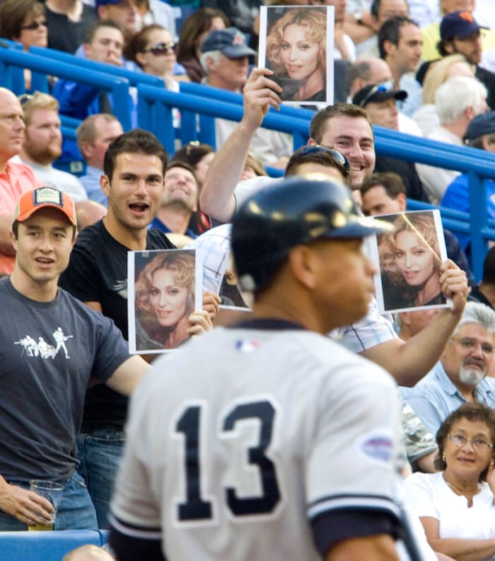 2008-Alex-Rodriguez-fans-Madonna-signs.jpg